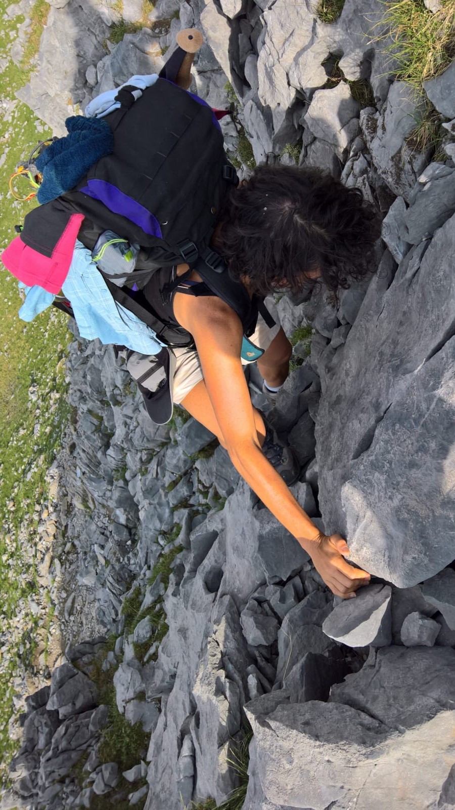 Shash, my wife, scaling a cliff